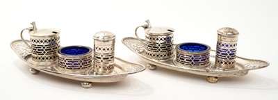 Lot 292 - Pair of silver condiment sets on stands