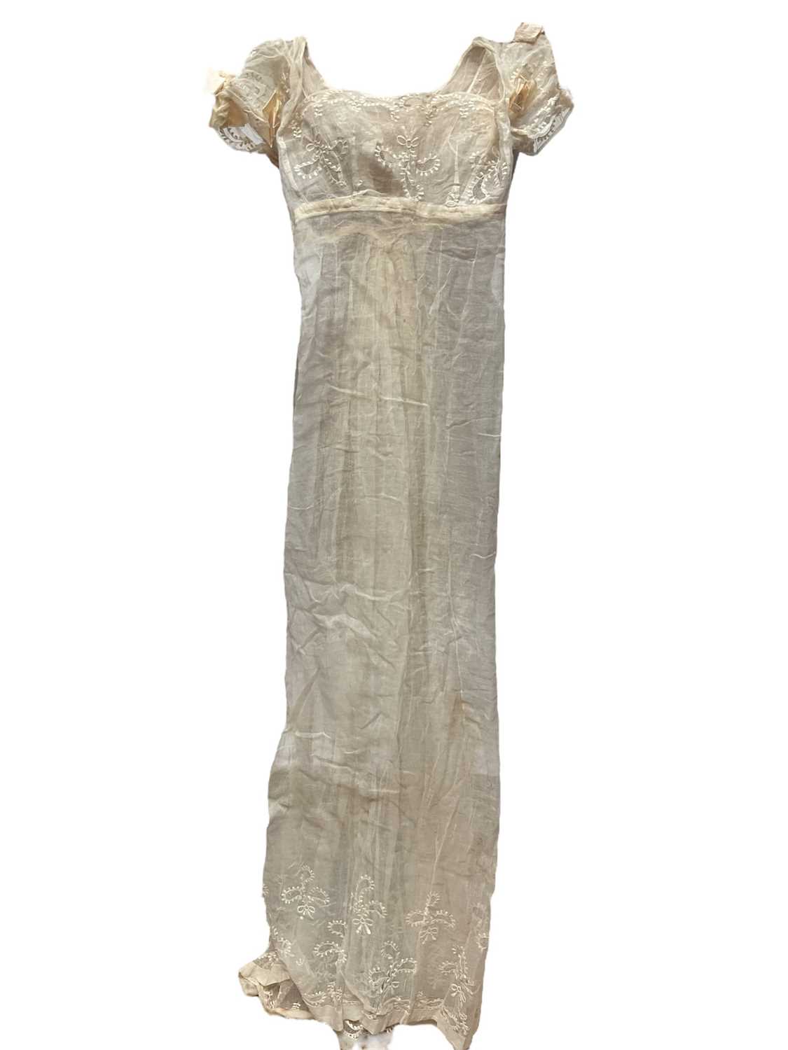 Lot 2051 - Late 18th century embroidered white muslin wedding dress, veil and matching items. Worn by Countess of Mansfield 1797.