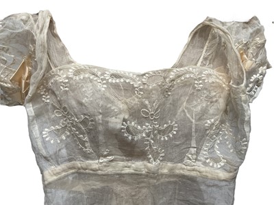 Lot 2051 - Late 18th century embroidered white muslin wedding dress, veil and matching items. Worn by Countess of Mansfield 1797.