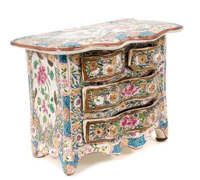 Lot 91 - Continental tin glazed miniature chest of drawers