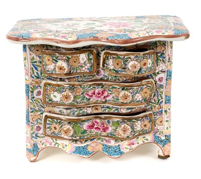 Lot 91 - Continental tin glazed miniature chest of drawers