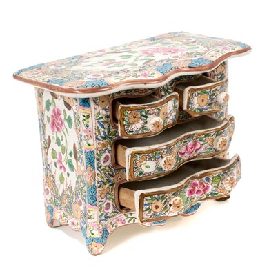 Lot 91 - Continental tin glazed miniature chest of drawers