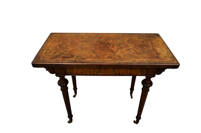 Lot 1660 - Victorian figured walnut card table