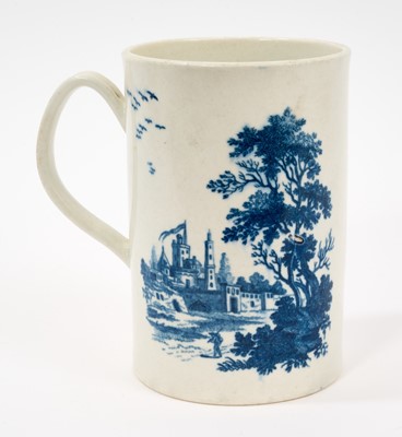 Lot 73 - A Worcester blue and white tankard with printed decoration from the European Landscapes group, circa 1775, grooved handle, crescent mark, 14.25cm high
