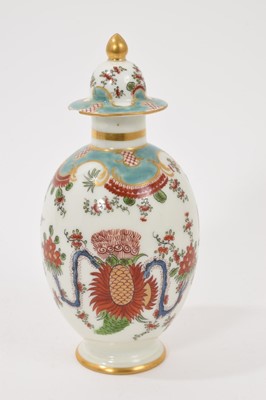 Lot 82 - A 19th century Samson porcelain tea canister, decorated in the Worcester style with the Jabberwocky pattern, square mark to base, 17.5cm high