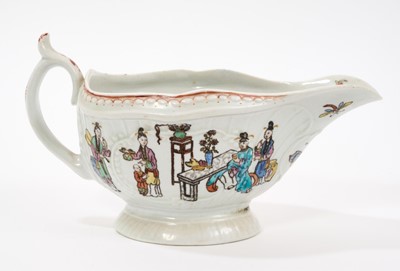 Lot 6 - A rare Worcester sauceboat, circa 1755, printed in the Smoky Primitive manner with the Chinese Family pattern, the interior printed with Chinese figures, hand coloured and with floral spray b...