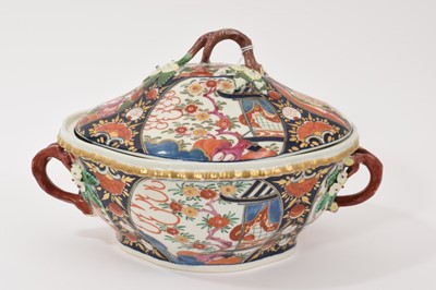 Lot 31 - A rare Worcester tureen and cover, circa 1770, painted in the Pavilion pattern, with naturalistic handles, 29cm wide including handles