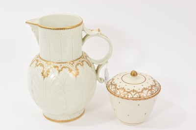 Lot 49 - A Worcester cabbage leaf jug, sucrier and cover, circa 1770, with gilt decoration done in the atelier of James Giles, the jug 22.75cm high (3) Provenance: the jug from the Bayley Collecti...