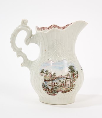 Lot 7 - A very rare early Worcester cream jug, circa 1754, finely moulded with a strap-fluted design and scrollwork cartouches painted with chinoiserie landscapes, echoing the style of Herold's designs...