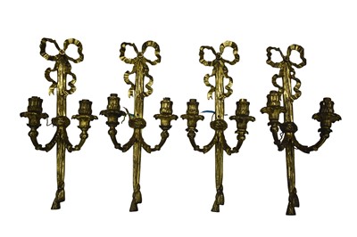 Lot 1710 - Set of four gilt metal wall lights
