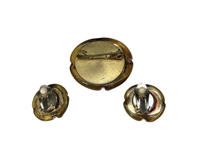 Lot 86 - Bimini pressed glass brooch and pair of matching clip on earrings all with gilt horse decoration