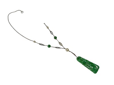 Lot 87 - 1920s Chinese carved jade pendant necklace