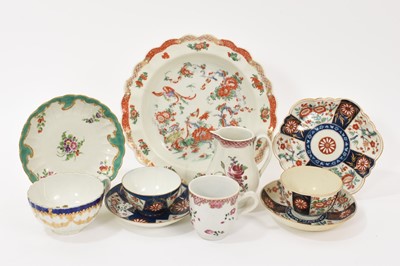 Lot 80 - Group of 18th century Worcester, including a plate, circa 1765-70, painted with a phoenix and dragon pattern in the Kakiemon style, a Queen's pattern teapot stand, a turquoise ground saucer with...