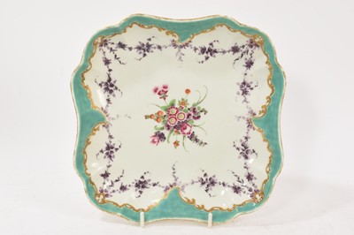 Lot 54 - A Worcester dish, circa 1770, of square scalloped form, painted with puce swags and a central bouquet, possibly in the atelier of James Giles, with turquoise and gilt scroll edge, 21.25cm wide
