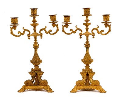 Lot 1120 - Pair of ornate 19th century French Napoleon III ormolu three light candelabra