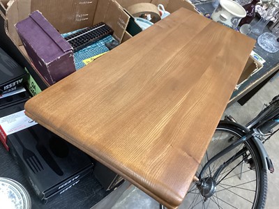 Lot 1252 - Ercol extending dining table with two extra leaves opening to 226cm x 90cm (155cm with no leaves) together with a set of eight Ercol stick back chairs including one carver