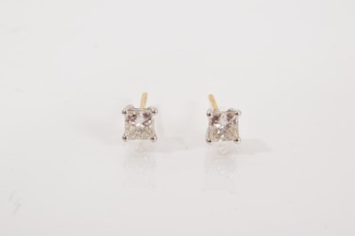 Lot 660 - Pair of diamond single stone earrings