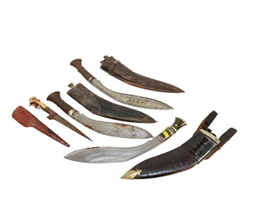 Lot 863 - Three old Gurkha kukris together with a Kyber knife with bone hilt (4)