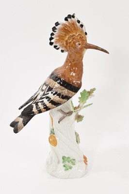 Lot 130 - A Meissen figure of a Hoopoe bird, naturalistically modelled and polychrome painted, shown perched on a branch, incised '278' and '290', crossed swords mark