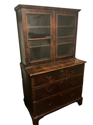 Lot 1512 - Early 18th century walnut cross banded bookcase on secretaire chest<...