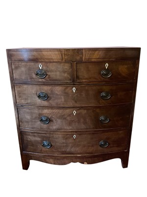 Lot 1517 - Regency mahogany and ebony line inlaid bowfront chest