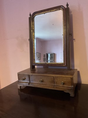 Lot 1518 - George III mahogany swing frame toilet mirror