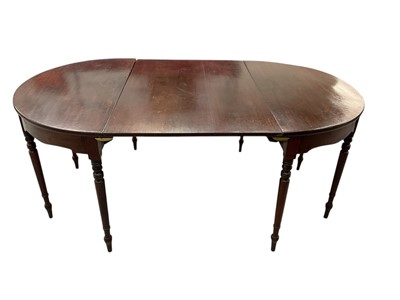 Lot 1529 - Regency mahogany and ebony line inlaid dining table