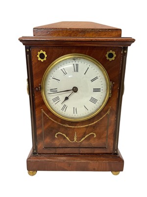 Lot 809 - Early 19th century mantel clock in a brass inlaid mahogany case.
