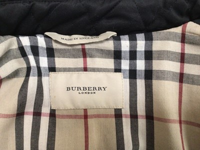 Lot 2093 - Burberry women's black quilted coat size medium