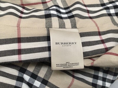 Lot 2093 - Burberry women's black quilted coat size medium