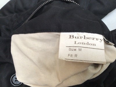 Lot 2093 - Burberry women's black quilted coat size medium