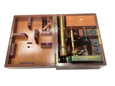 Lot 2413 - Victorian students brass microscope in mahogany case with accessories