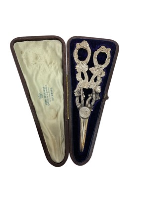 Lot 319 - Pair of Victorian silver grape scissors by George Unite, in original fitted leather case