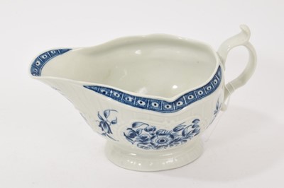 Lot 195 - Worcester pleat moulded oval sauceboat, painted with flowers, circa 1770