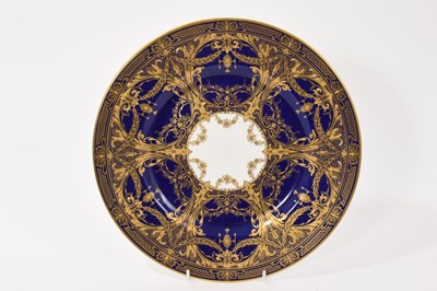 Lot 173 - Royal Worcester blue ground plate, with fine raised paste gilding
