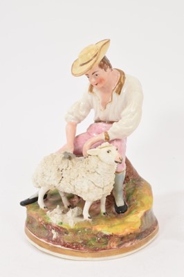 Lot 206 - Dudson type figure of a shepherd sheering a sheep, circa 1840