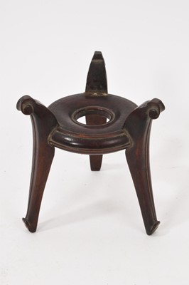 Lot 767 - Chinese hardwood three legged bowl stand