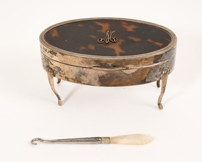 Lot 442 - Silver mounted tortoiseshell oval dressing table box