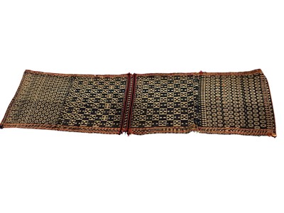Lot 1748 - Belouche saddle bag with geometric designs and red border