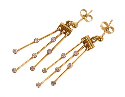 Lot 679 - Pair of gold and diamond tassel drop earrings