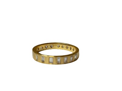 Lot 26 - Diamond full band eternity ring with baguette cut diamonds in 18ct gold setting