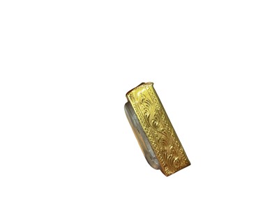 Lot 30 - Eastern religious tablet in yellow metal pendant setting, a blue stone pendant in 18ct gold setting and a 9ct rose gold Welsh love spoon pendant (3)