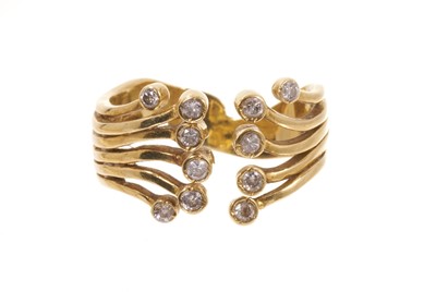 Lot 571 - 18ct gold and diamond dress ring with twelve diamond set stylized tendrils, sponsor's mark EF ltd, Sheffield 1993.