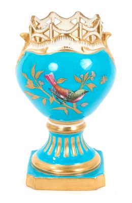 Lot 840 - Mintons Aesthetic style vase with reticulated border, decorated in relief with birds in polychrome enamels and gilt, on a turquoise ground
