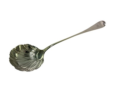 Lot 388 - George III silver Old English pattern soup ladle, with shell bowl and engraved initials