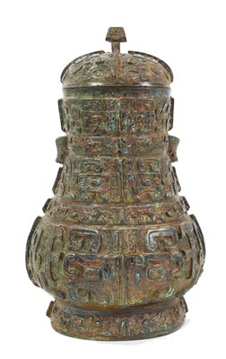 Lot 864 - Antique Archaic style Chinese bronze Hu vase and cover