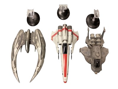 Lot 1862 - Model Cylon Raider, Colonial Raptor & Viper, plus Star Trek spaceships, with stands (10)