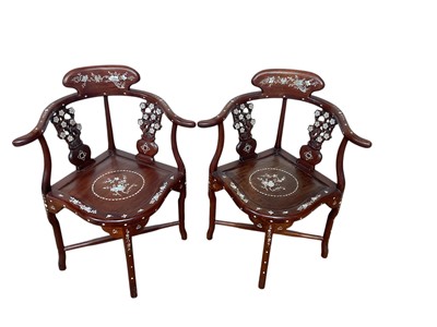 Lot 5345 - Pair of Chinese hardwood corner chairs with inlaid mother of pearl decoration (2).