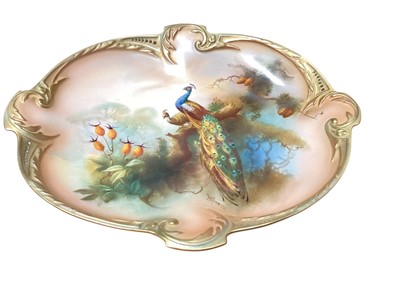 Lot 1129 - Royal Worcester porcelain cabinet plate with hand painted peacock decoration, signed W. Powell