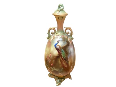 Lot 1127 - Royal Worcester porcelain vase and cover with hand painted peacock decoration, signed W. Powell